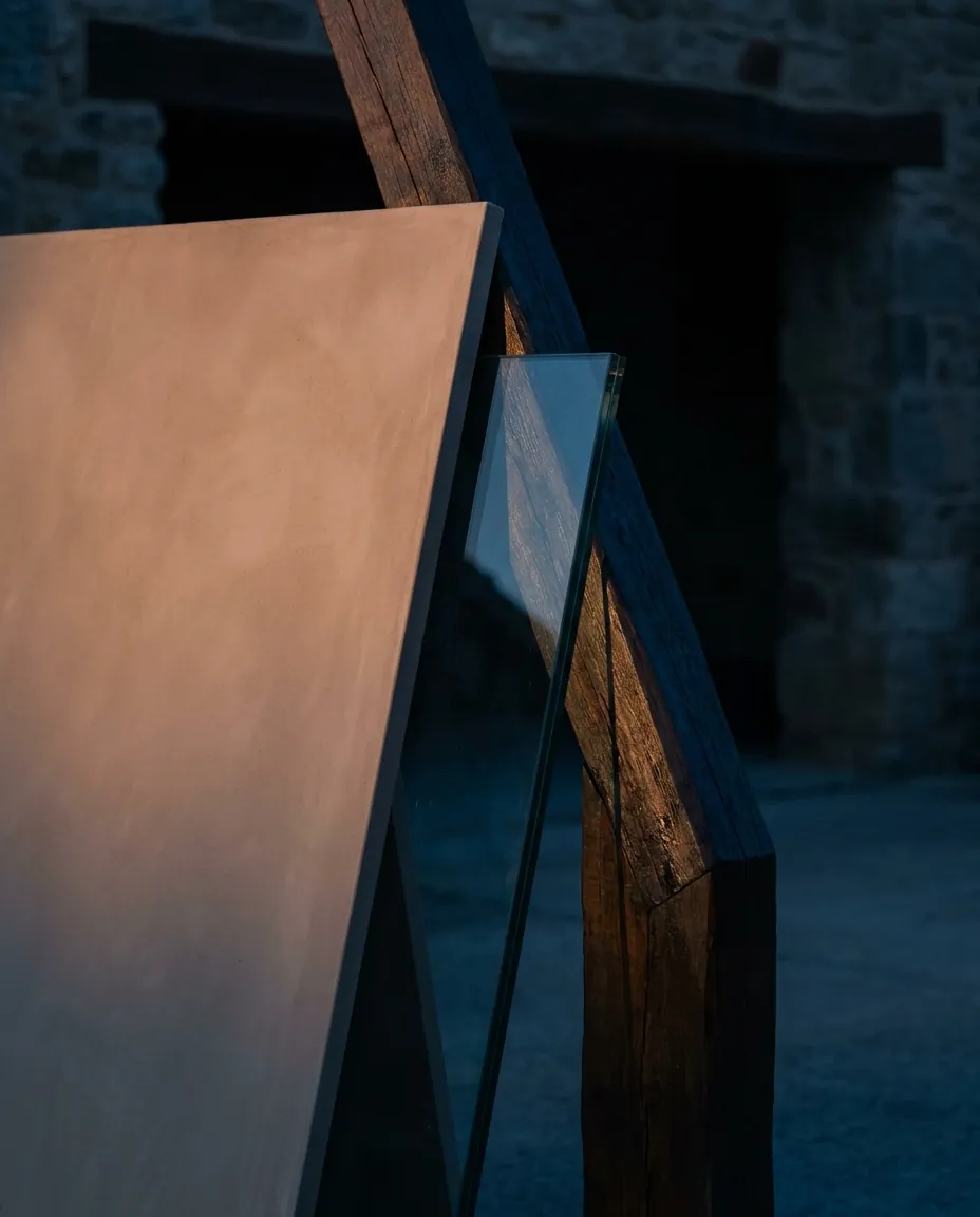 Material study — plaster, timber and glass planes in dusk light